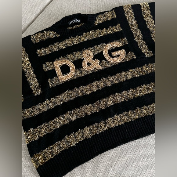 DOLCE&GABBANA
Cashmere blends
Black and gold sweater - Picture 3 of 13